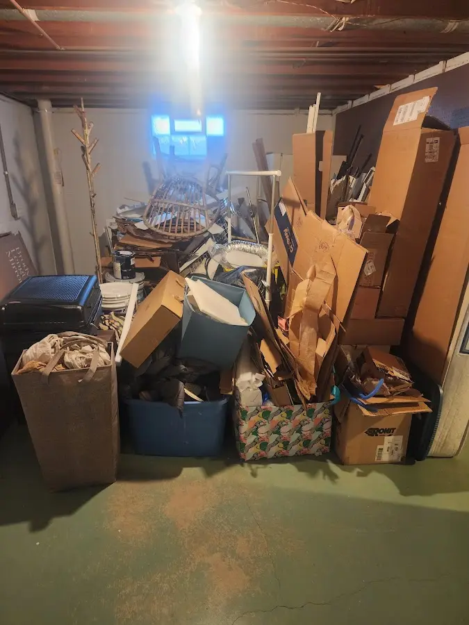 Roll-off dumpster container at job site for 6 Yard Dumpster Rental in Amherst